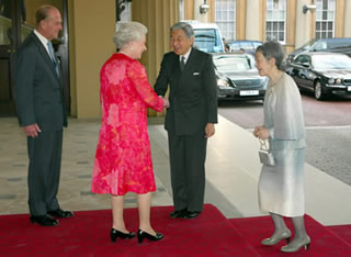 Their Majesties are welcomed by Her Majesty The Queen and His Royal Highness The Duke of Edinburgh at the Grand Entrance to Buckingham Palace. (29 May)