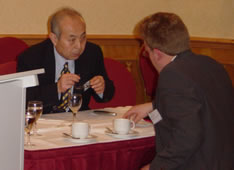 Mr Harada gives advice to a British businessman