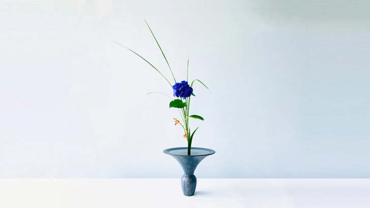 IMG:two thin long grass with dark blue lower Japanese style arrangement