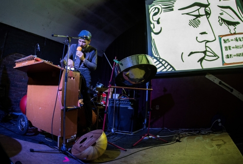 Img:man srounding with instulments with screen with Anima