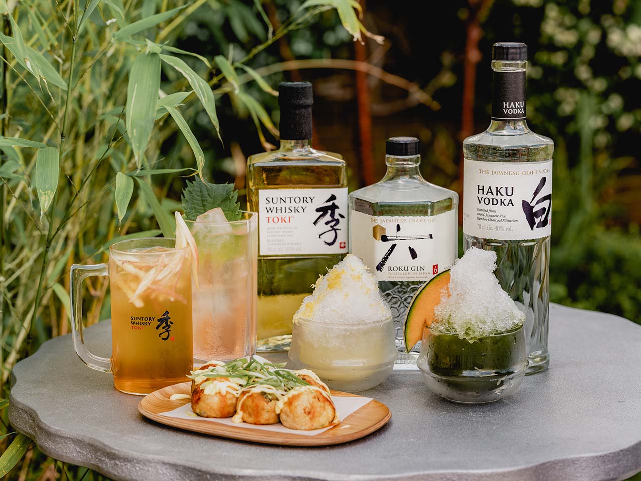 Img:3 bottle of Gin and 2 shaved iced cackteladn 2 glass and takoyaki