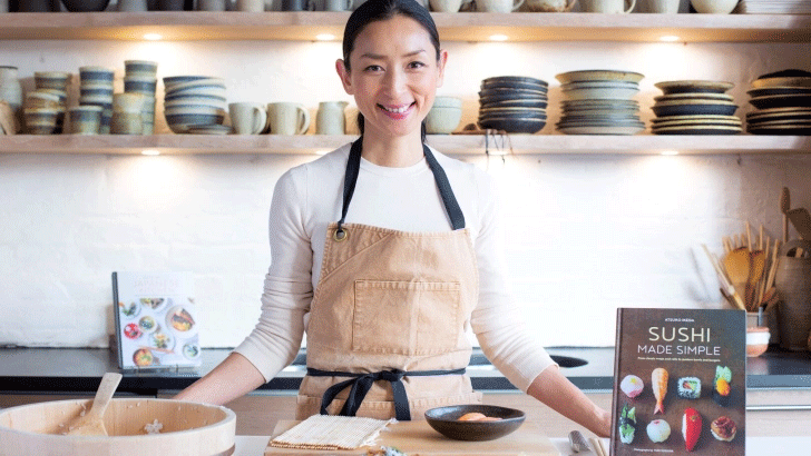IMG:Woman in front of cooking bench