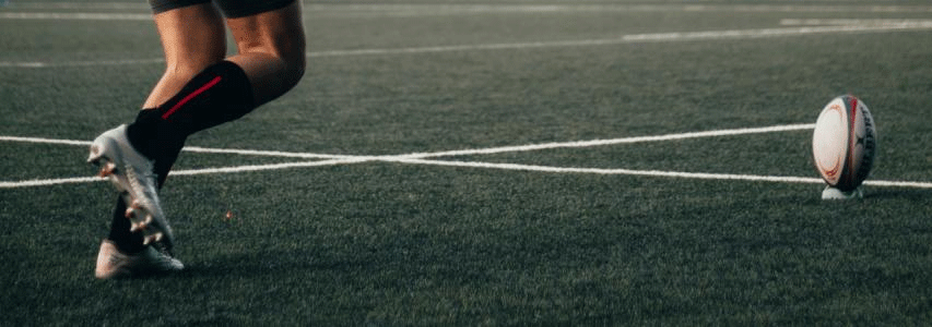 Img:set up rugby ball for the kick