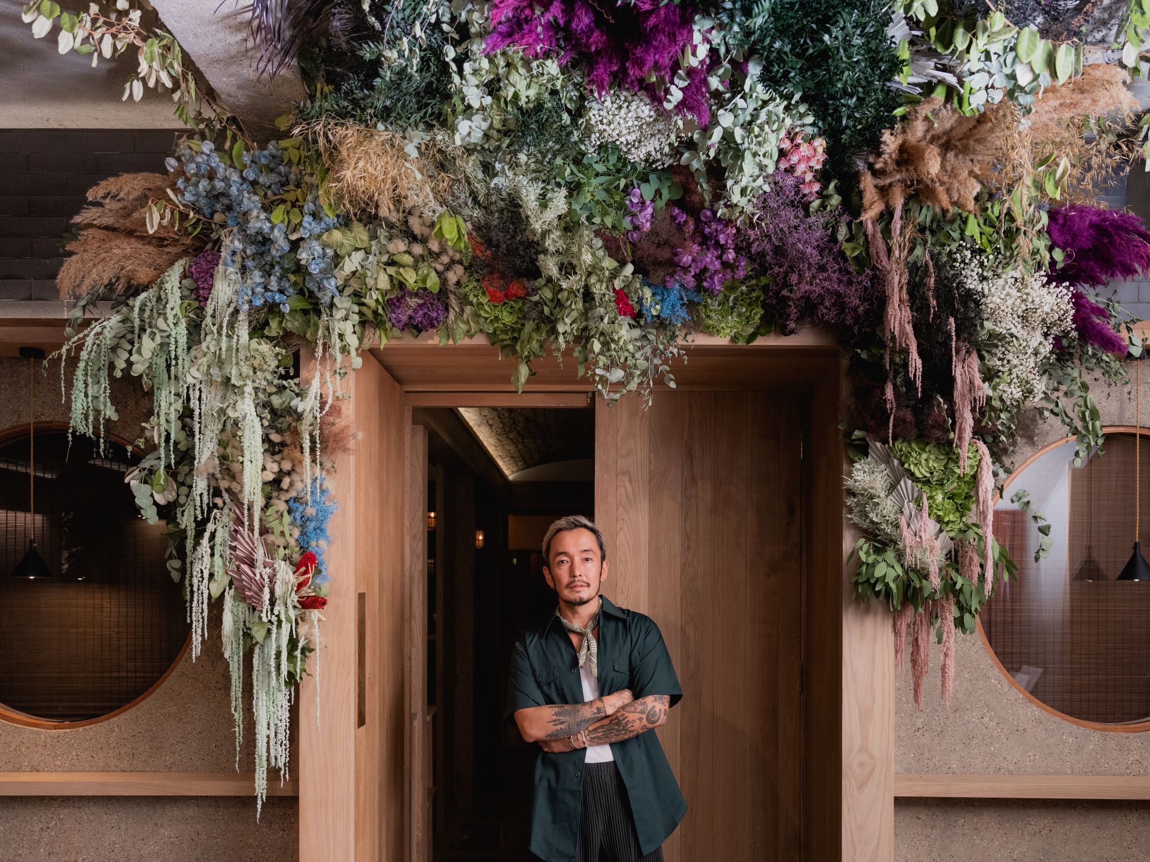 Man standing in front of plant installation