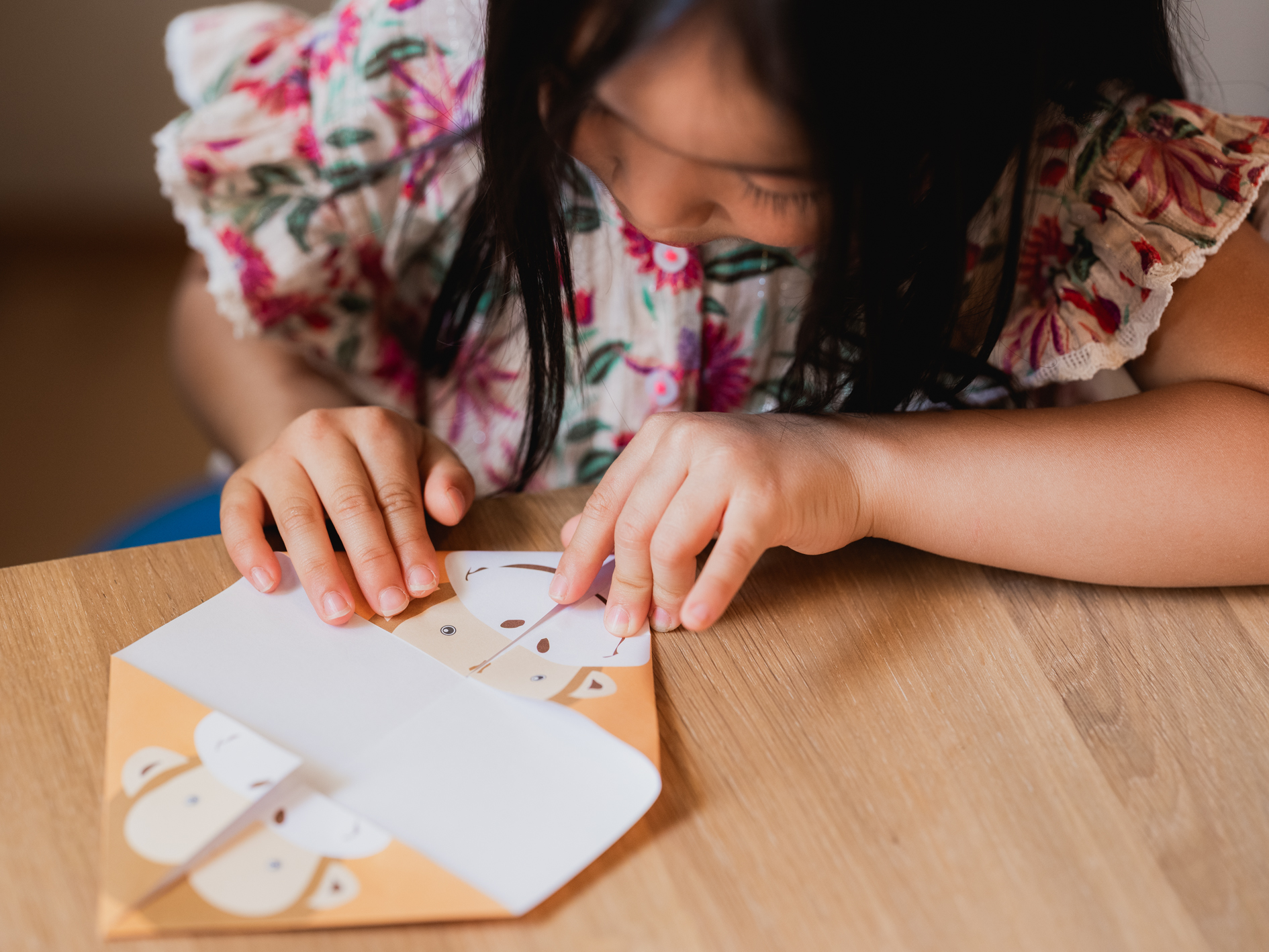 Img:Child folding origami