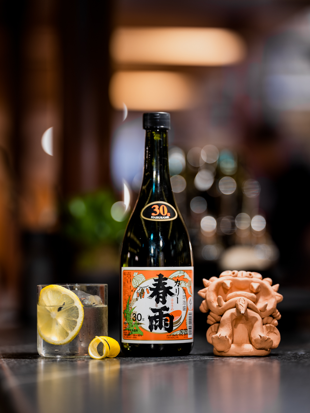 Img: Okinawan lions and awamori bottle