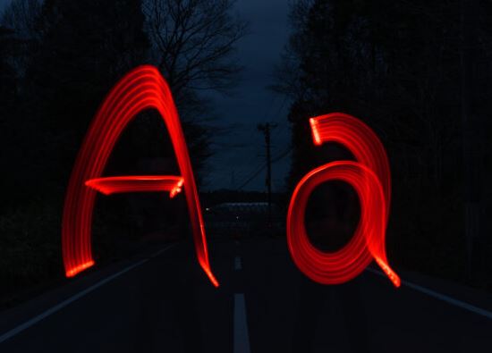 Img:Letters capital A and lower-case A in red neon letters