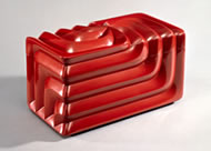Ornamental box in a flowing design, lacquer on wood using red lacquer (sekishitsu) by Kuroda Tatsuaki, 1957