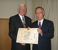 Ambassador Orita presents Professor Ewart with his Commendation 