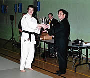 Minister Kishino presenting the Matsudaira Cup to Gary Chandler 
