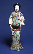 Japanese, Arita; Kakiemon style, c.1680-1700 Figure of a bijin (beautiful lady)