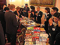Participants gather information about Kansai at the tabletop exhibition